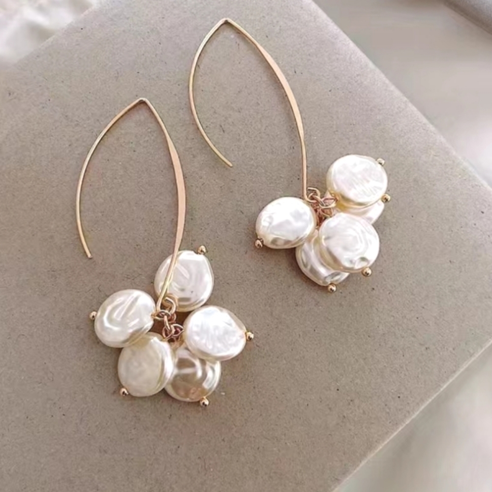 Vintage style Faux pearl clusters on golden elongated inverted V shaped earrings